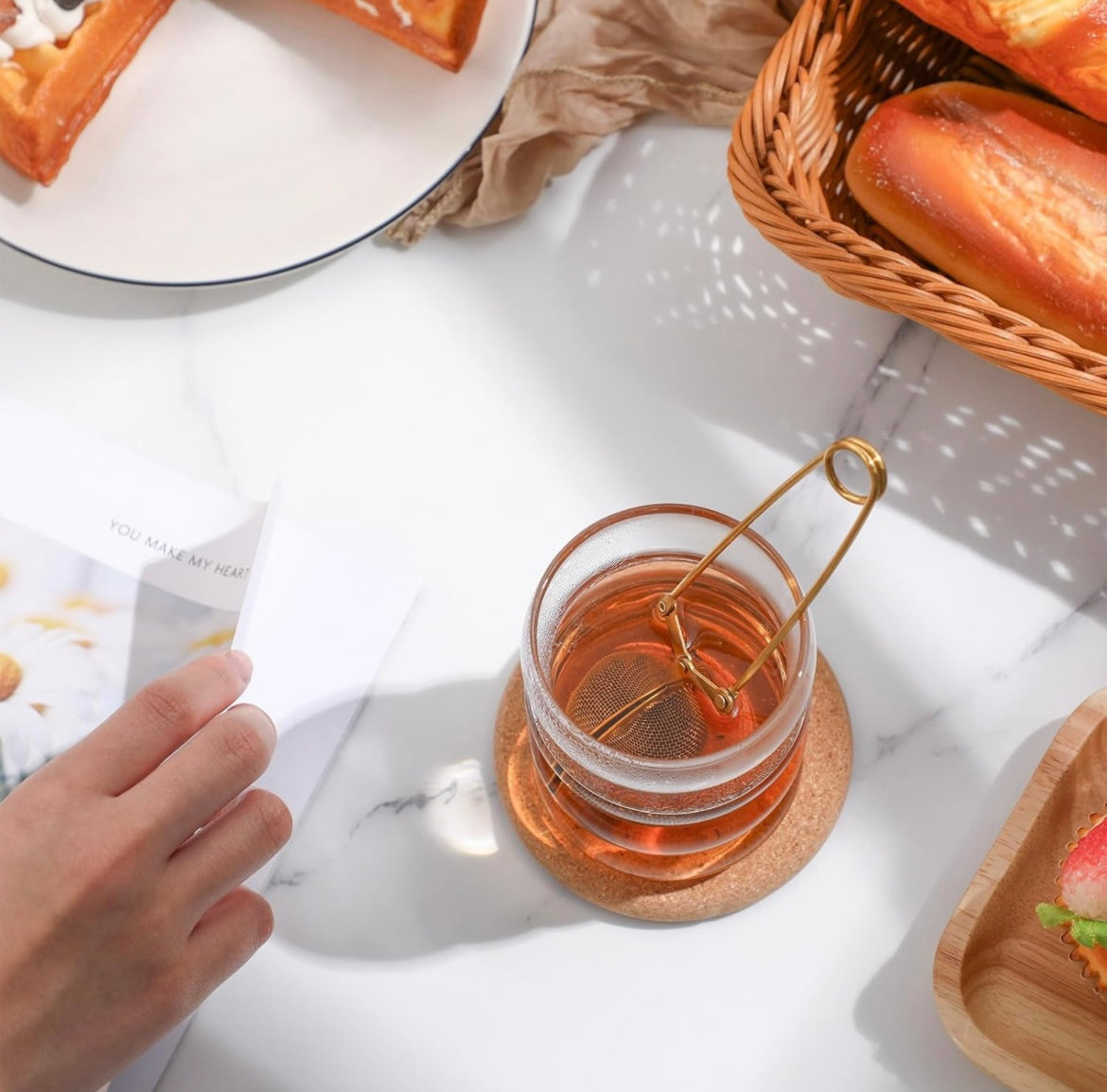 Infusor de té de hojas sueltas de pinza